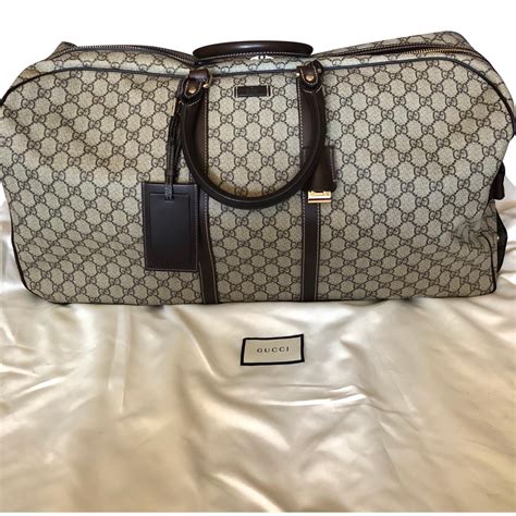 gucci women's travel bag|Gucci travel bag with wheels.